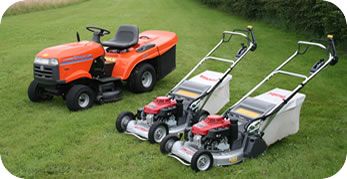 Some of the garden tractors and lawn mowers we use.
